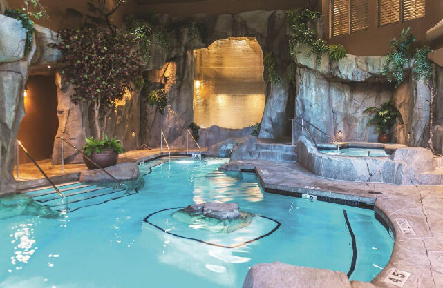 inside the grotto spa showing the pool and hot tub